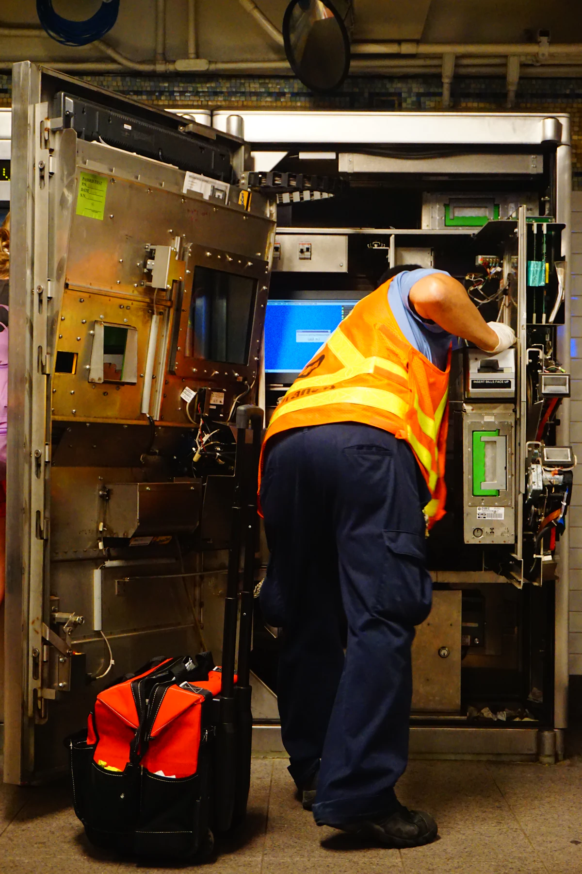 A technician servicing a heating and cooling system