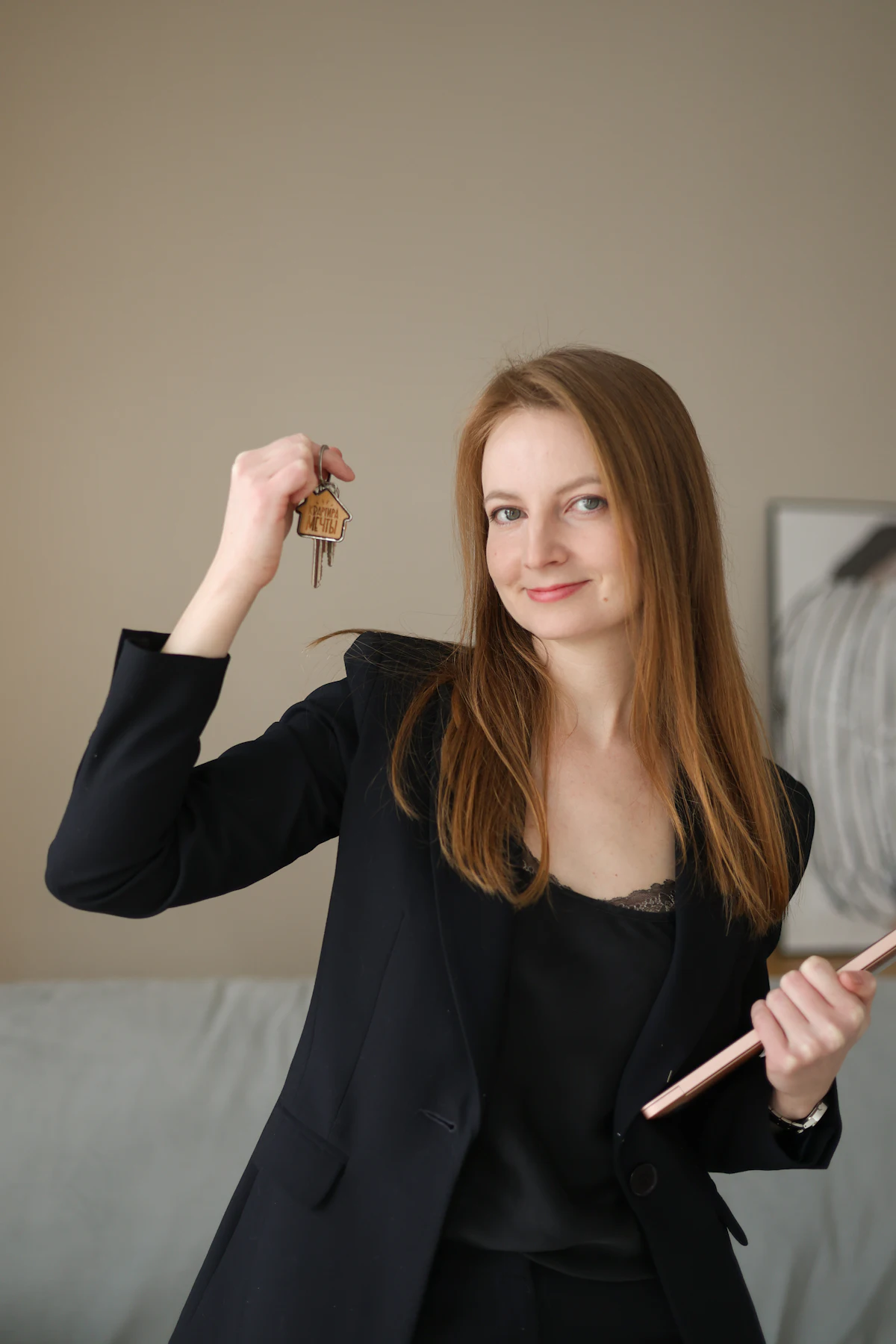 A property manager with keys and paperwork ready for a new tenant